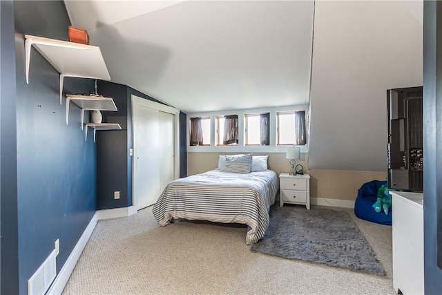 4872 Bedford Dr, Canandaigua-Town, NY 14424 - carpeted bedroom featuring vaulted ceiling, visible vents, and baseboards