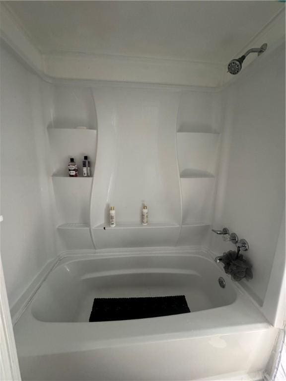 bathroom with shower / tub combination