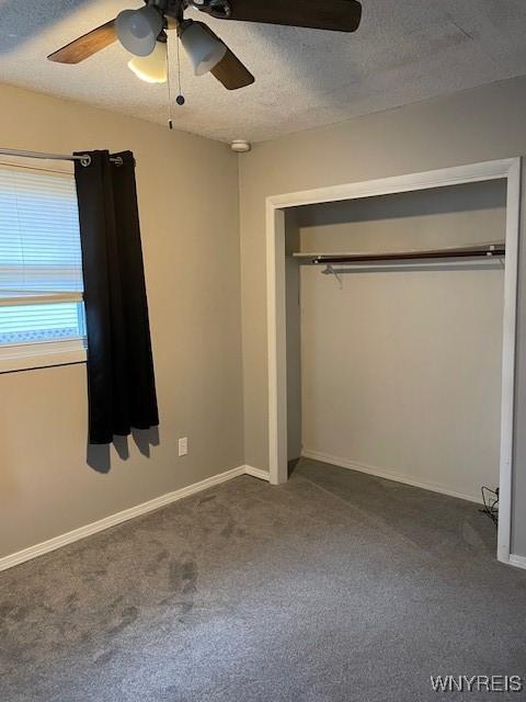 13289 Lakeview Dr, Carlton, NY 14571 - unfurnished bedroom with ceiling fan, carpet floors, a textured ceiling, and a closet