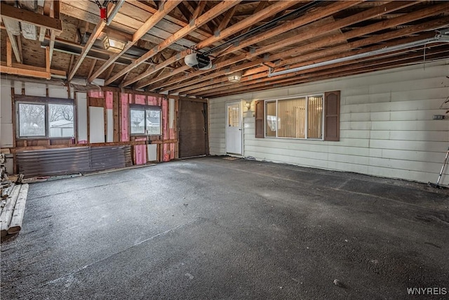 garage featuring a garage door opener