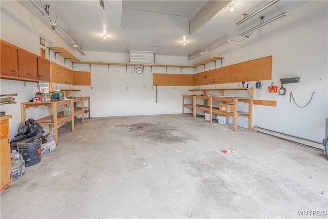 garage with a workshop area