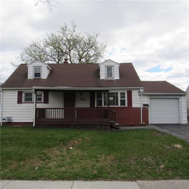 cape cod home featuring a front yard, a garage, covered porch, aphalt driveway, and brick siding