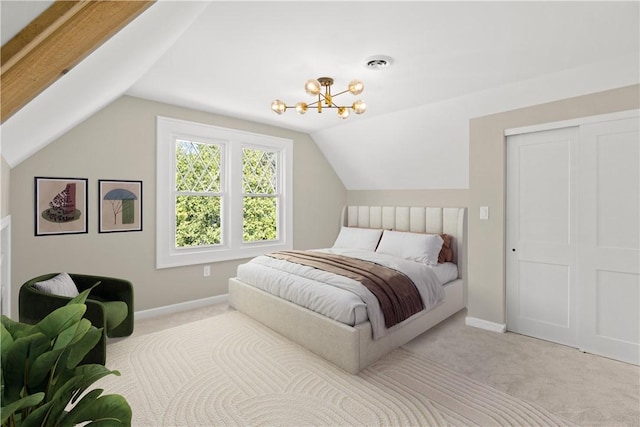 bedroom featuring visible vents, baseboards, vaulted ceiling, and carpet flooring