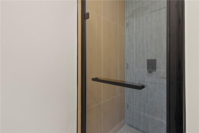 bathroom featuring a stall shower