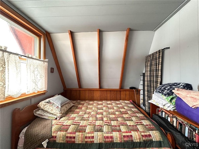 bedroom featuring vaulted ceiling