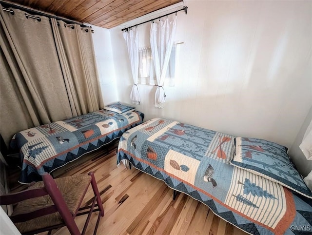 bedroom featuring wood finished floors