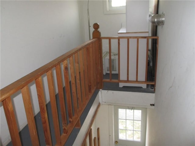 stairs featuring plenty of natural light