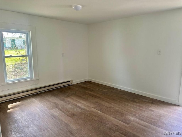 unfurnished room featuring baseboards, a baseboard radiator, and dark wood finished floors