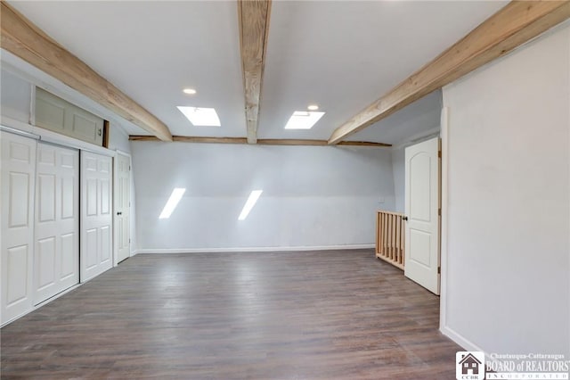 finished basement featuring baseboards, dark wood-style flooring, and recessed lighting