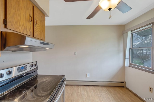 kitchen with ceiling fan, stainless steel electric stove, light wood-type flooring, under cabinet range hood, and a baseboard heating unit