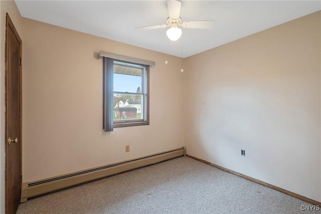 carpeted spare room featuring baseboards, a baseboard radiator, and ceiling fan