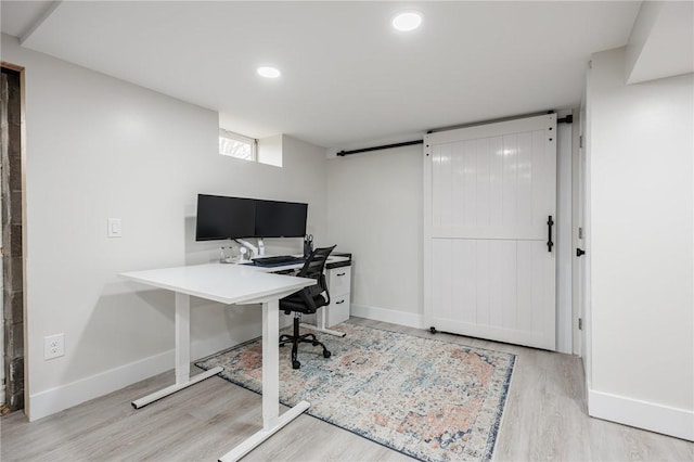 office area featuring baseboards, wood finished floors, and recessed lighting