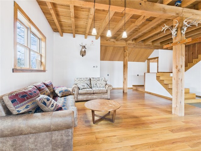 651 Dennis Hill Rd, Harrison, PA 16948 - living area with wood ceiling, stairway, beamed ceiling, and light wood-type flooring