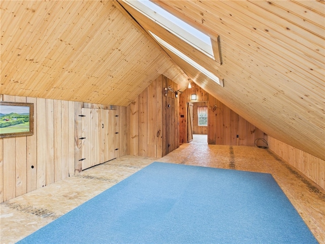 651 Dennis Hill Rd, Harrison, PA 16948 - additional living space featuring wood walls, a skylight, and lofted ceiling