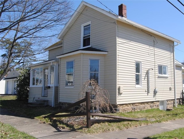 230 Birch St, Kane-Borough, PA 16735 - view of home's exterior with a chimney and entry steps
