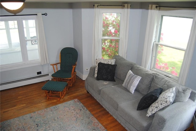 230 Birch St, Kane-Borough, PA 16735 - living room with a baseboard radiator and wood finished floors