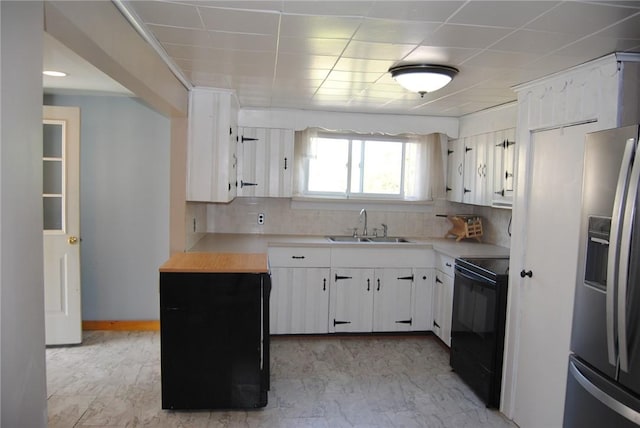 230 Birch St, Kane-Borough, PA 16735 - kitchen featuring stainless steel refrigerator with ice dispenser, black electric range oven, light countertops, decorative backsplash, and a paneled ceiling