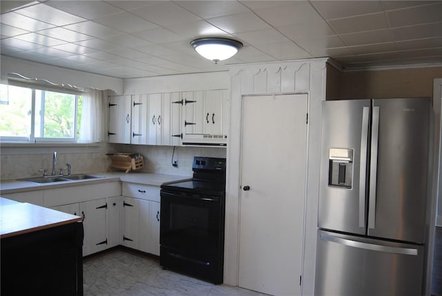230 Birch St, Kane-Borough, PA 16735 - kitchen with stainless steel fridge with ice dispenser, black range with electric cooktop, a sink, light countertops, and white cabinetry