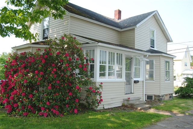 230 Birch St, Kane-Borough, PA 16735 - view of home's exterior featuring entry steps, a chimney, a yard, and a shingled roof