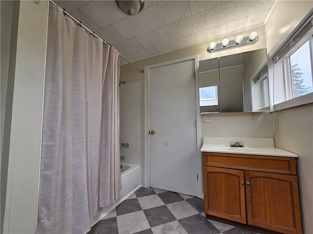 bathroom with vanity and shower / tub combo with curtain