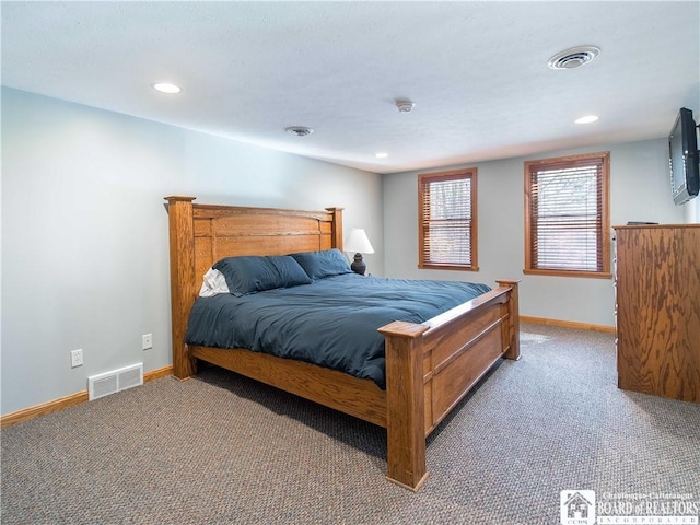 bedroom featuring carpet floors and visible vents