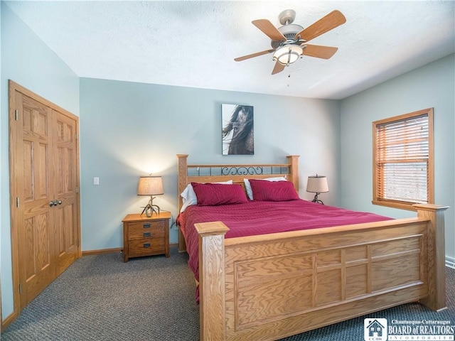 carpeted bedroom featuring a ceiling fan and baseboards