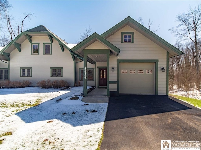view of front of property with an attached garage and driveway