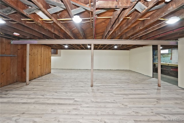 basement with wood finished floors