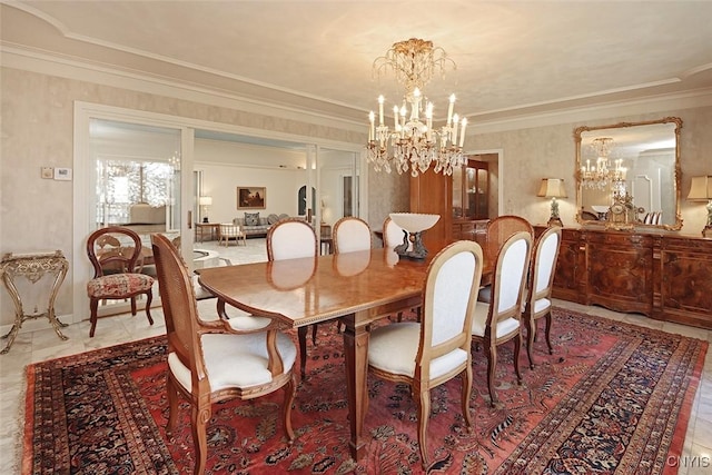 dining area with an inviting chandelier and ornamental molding