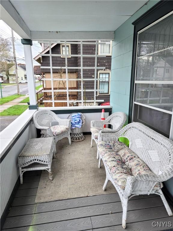 balcony featuring a porch