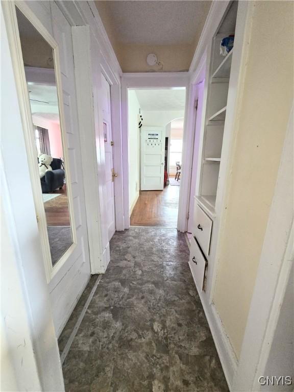 hall with arched walkways