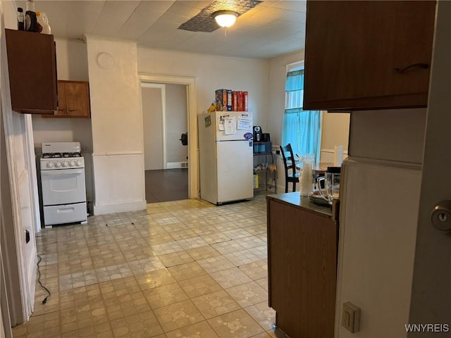 kitchen featuring white appliances