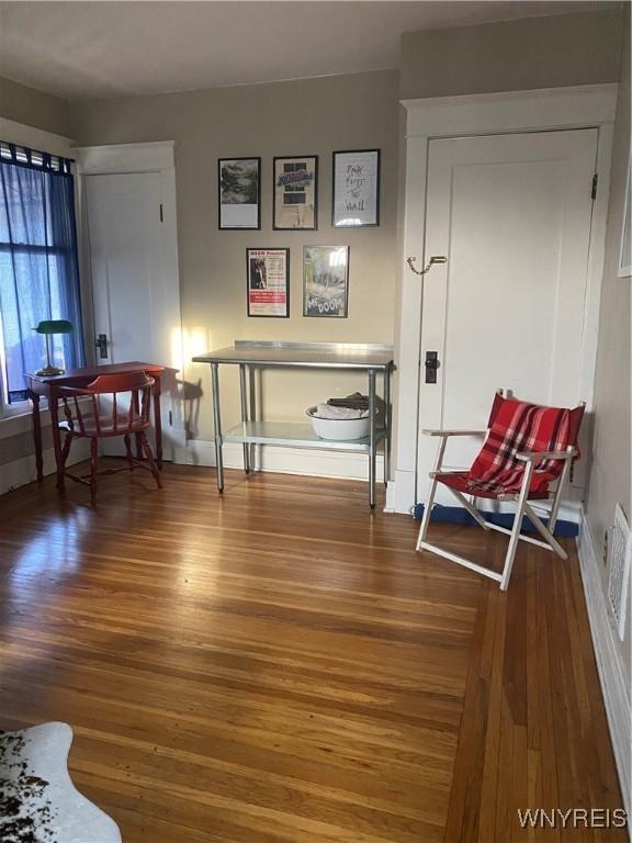 435 Tacoma Ave, Buffalo, NY 14216 - living area with baseboards and wood finished floors