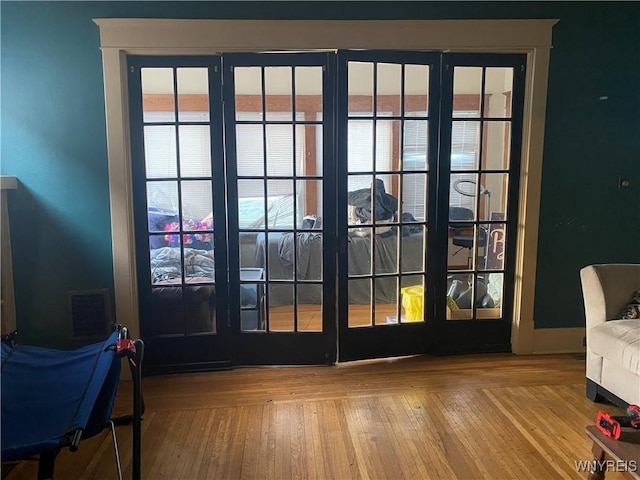 435 Tacoma Ave, Buffalo, NY 14216 - entryway with hardwood / wood-style floors, visible vents, plenty of natural light, and french doors