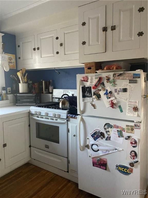 435 Tacoma Ave, Buffalo, NY 14216 - kitchen with white cabinets, white appliances, a toaster, and dark wood-style floors