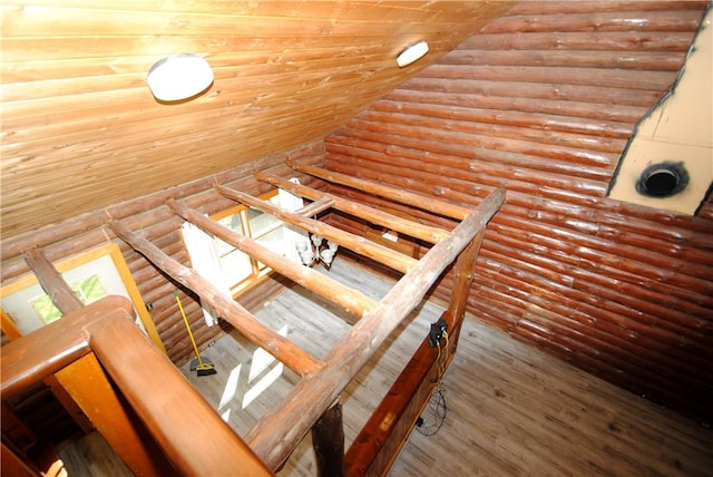 9221 Health St, North Dansville, NY 14437 - interior space with log walls and wood finished floors