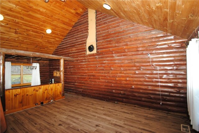 9221 Health St, North Dansville, NY 14437 - spare room featuring visible vents, wood finished floors, wooden ceiling, high vaulted ceiling, and rustic walls