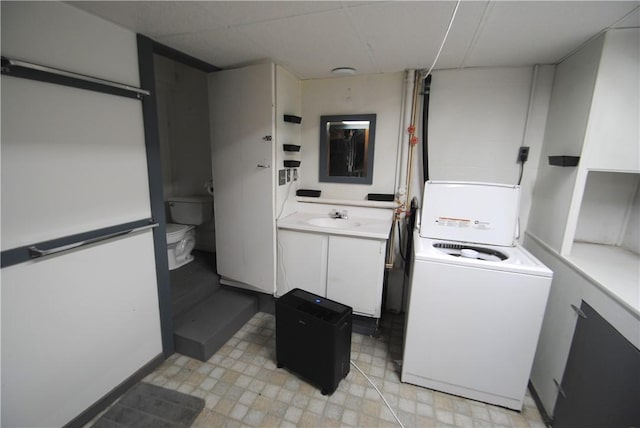 9221 Health St, North Dansville, NY 14437 - laundry room featuring a sink and washer / clothes dryer