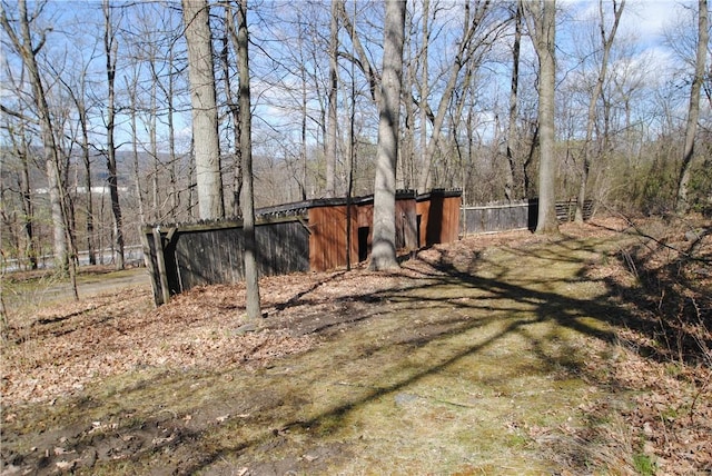 9221 Health St, North Dansville, NY 14437 - view of yard featuring fence and an outbuilding