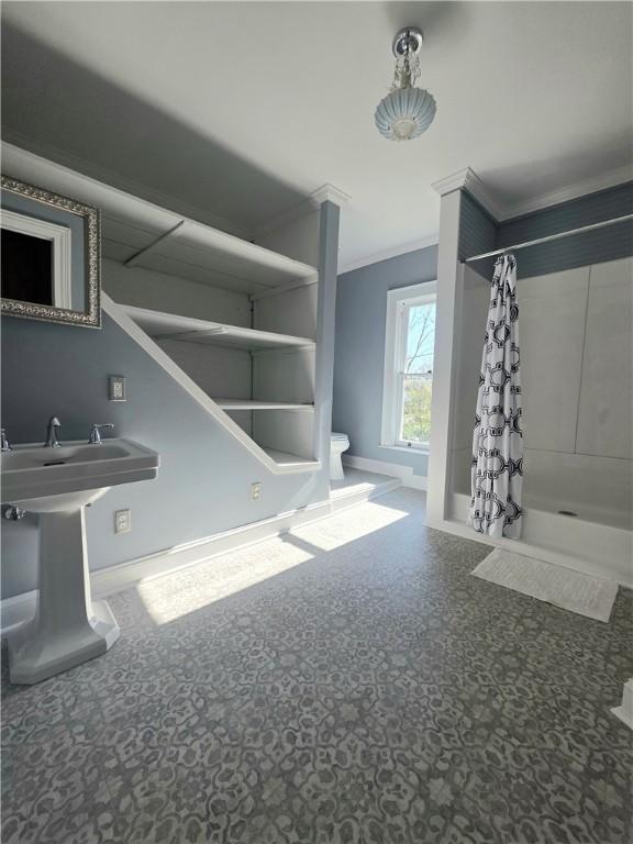 408 W Water St, Elmira-City, NY 14905 - interior space featuring baseboards and crown molding