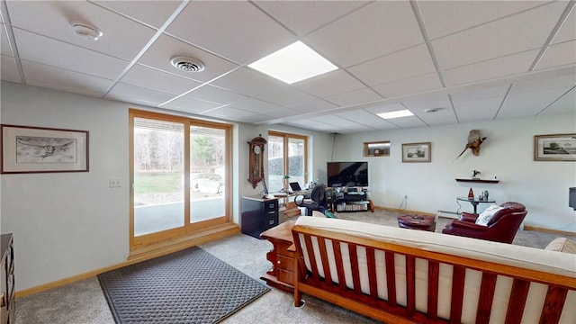 bedroom featuring visible vents, access to outside, a paneled ceiling, and carpet