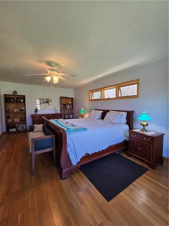 bedroom with wood finished floors and ceiling fan