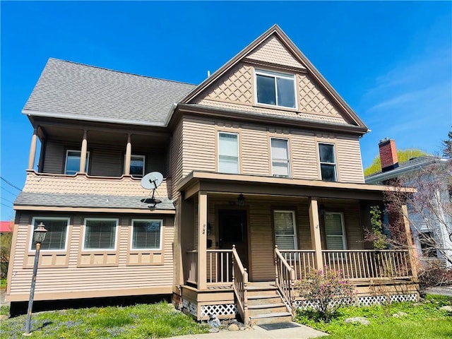 view of front of property featuring covered porch