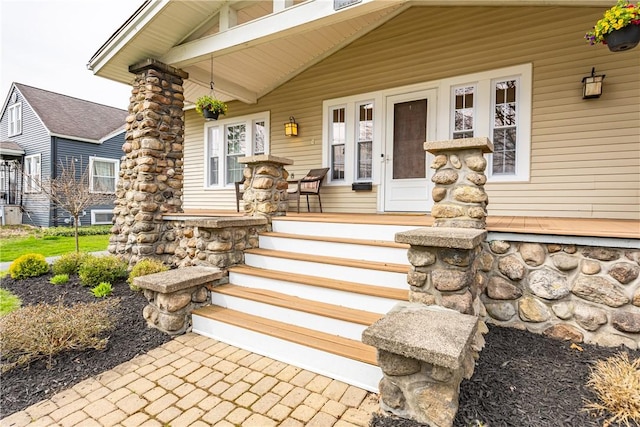 entrance to property with covered porch