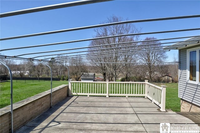 deck featuring a yard