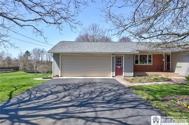 ranch-style house with a front lawn, aphalt driveway, an attached garage, fence, and roof with shingles