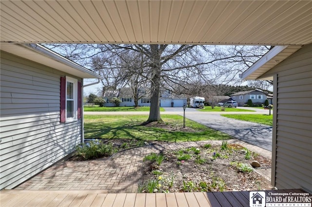 view of yard featuring a residential view