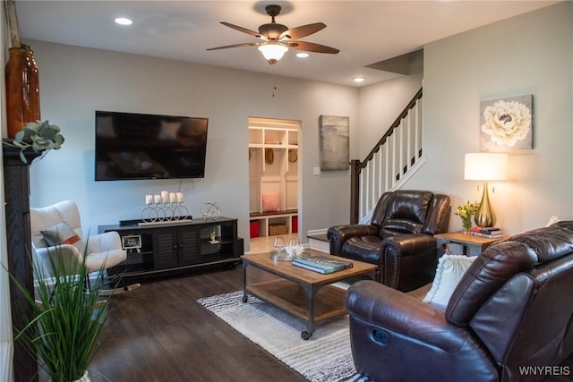 living room featuring stairs, a ceiling fan, wood finished floors, and recessed lighting