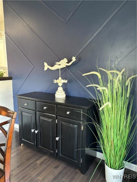 interior details featuring wood finished floors