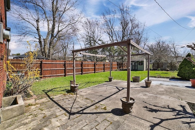35 University Ct, Amherst, NY 14226 - view of patio with a fenced backyard, an outdoor structure, and a storage shed